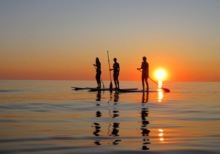 Surfing under Midnight Sun (SUP)