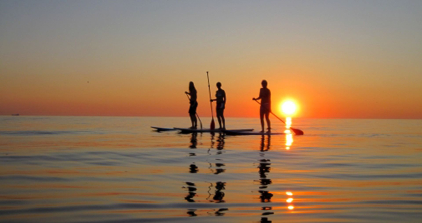Surfing under Midnight Sun (SUP)